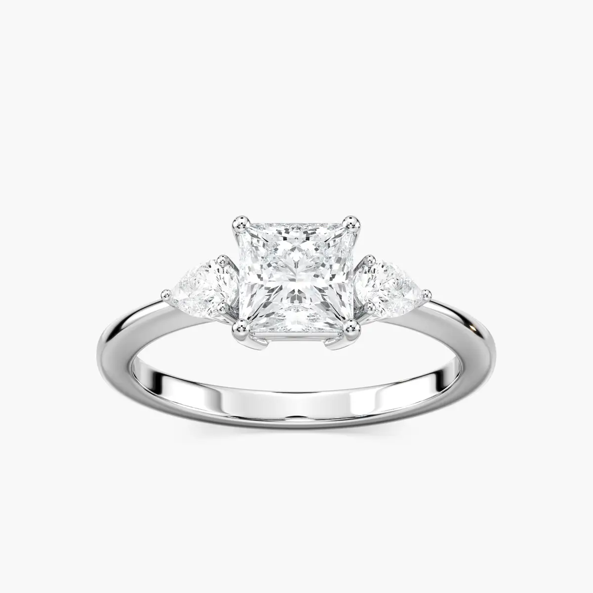 1 Carat Pear Flourish Three Stone Ring